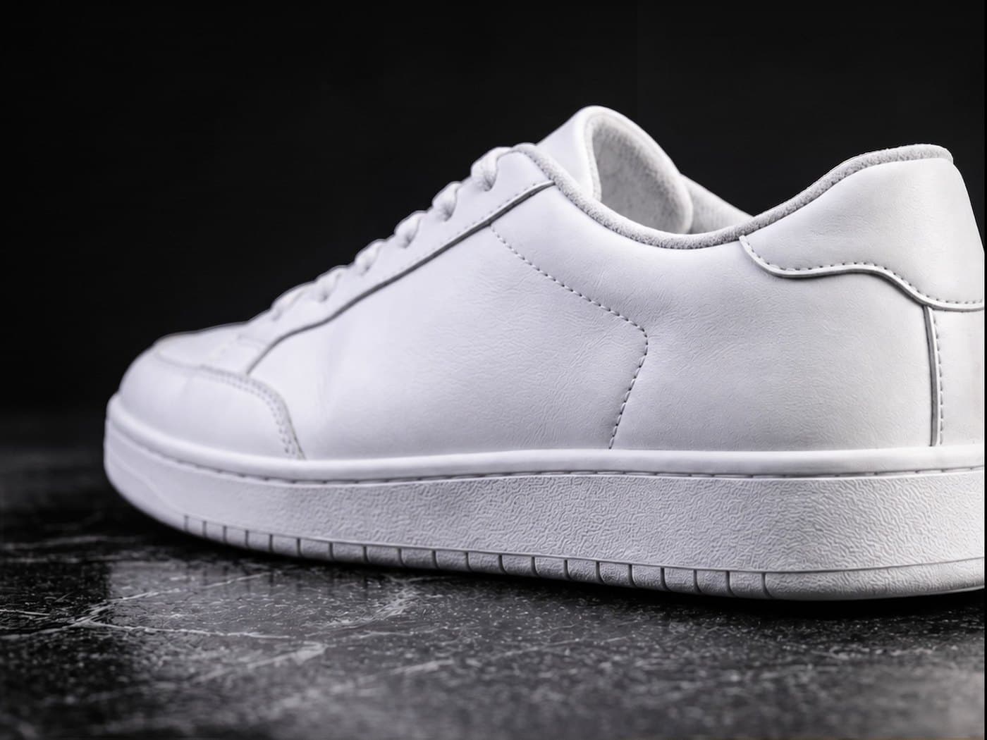 White sneaker care: upper and midsole compared after